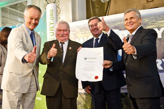 New7Wonders president Bernard Weber (left) presenting the Official Finalist Certificate for the Masurian Lake District in the New7Wonders of Nature to three presidents of Poland: Lech Wałęsa, Bronisław Komorowski and Aleksander Kwaśniewski