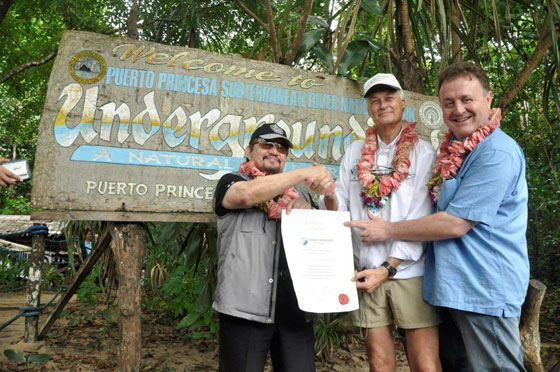 (Left to right) Puerto Princesa City Mayor Edward Hagedorn, New7Wonders President Bernard Weber, and New7Wonders Director Jean-Paul de la Fuente, at the handing over of the Official Certificate of Participation for the Puerto Princesa Subterranean River in Palawan, the Philippines.