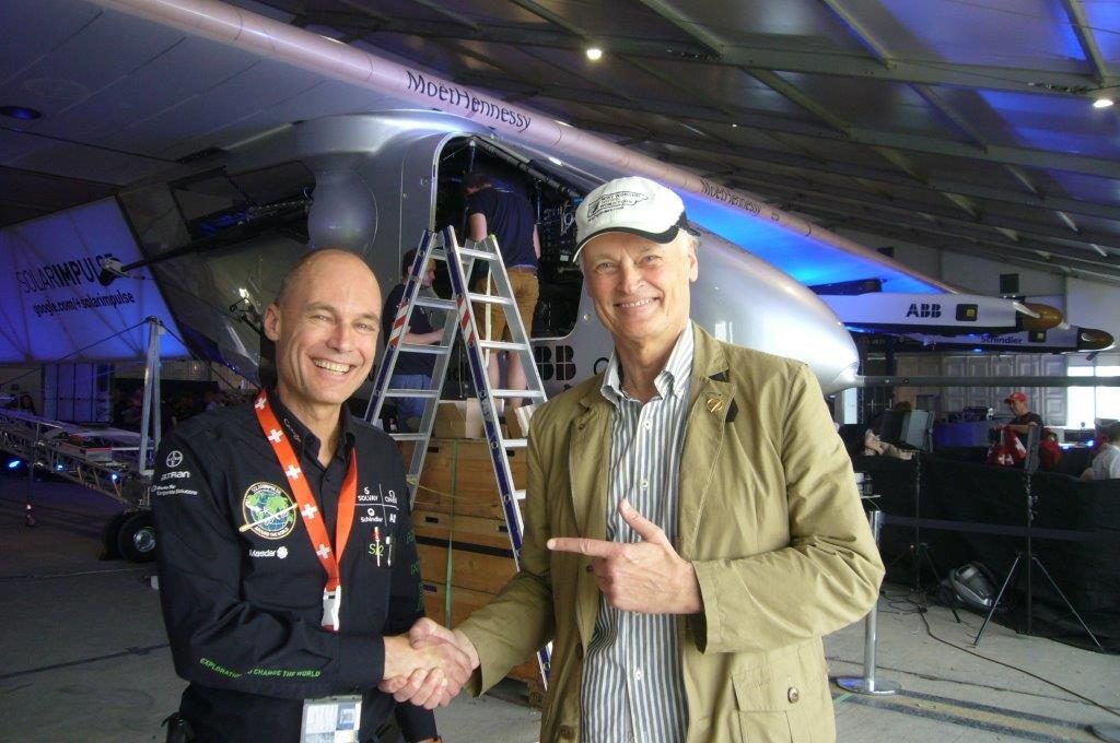 Abu Dhabi: Solar Impulse pilot Bertrand Piccard (left) receiving good luck wishes from Bernard Weber, Founder-President of New7Wonders (right), before his historic flight.
